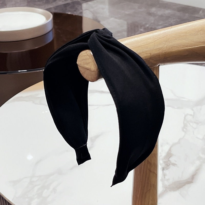 Fashionable fabric cross bow headband