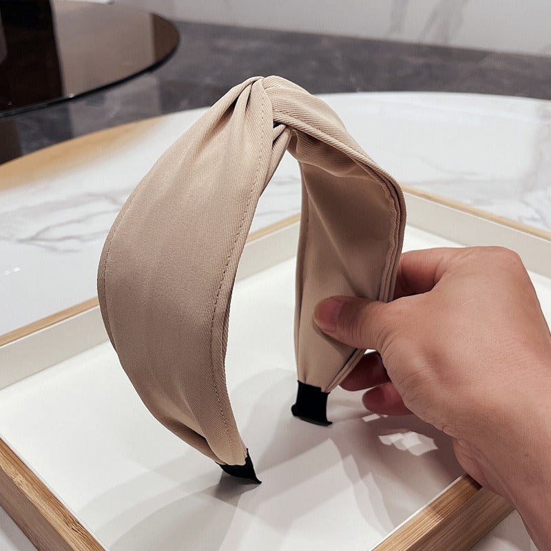 Fashionable fabric cross bow headband