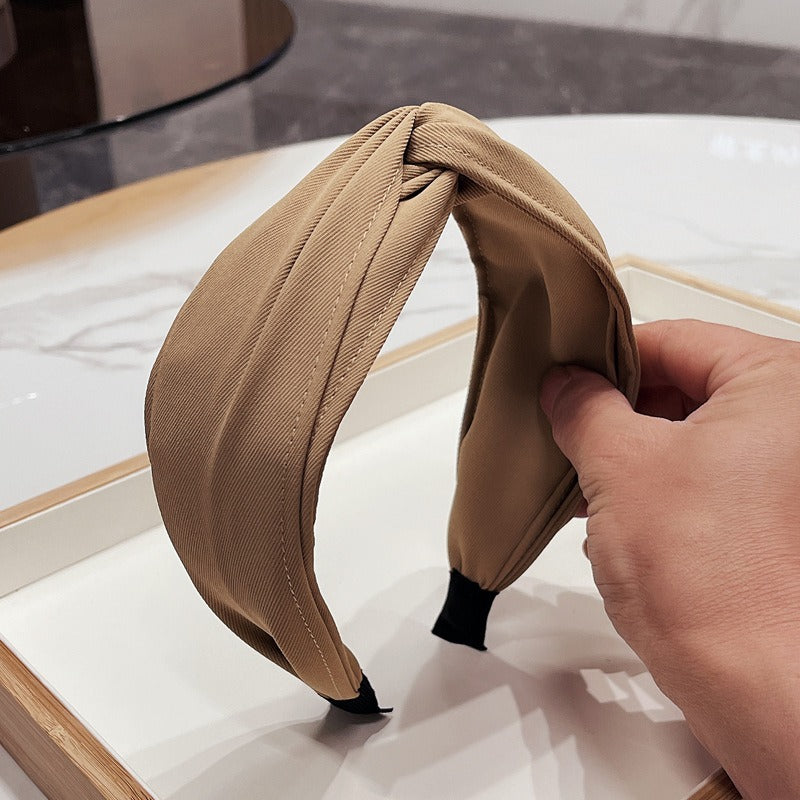 Fashionable fabric cross bow headband