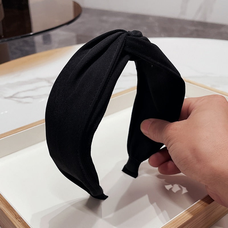 Fashionable fabric cross bow headband